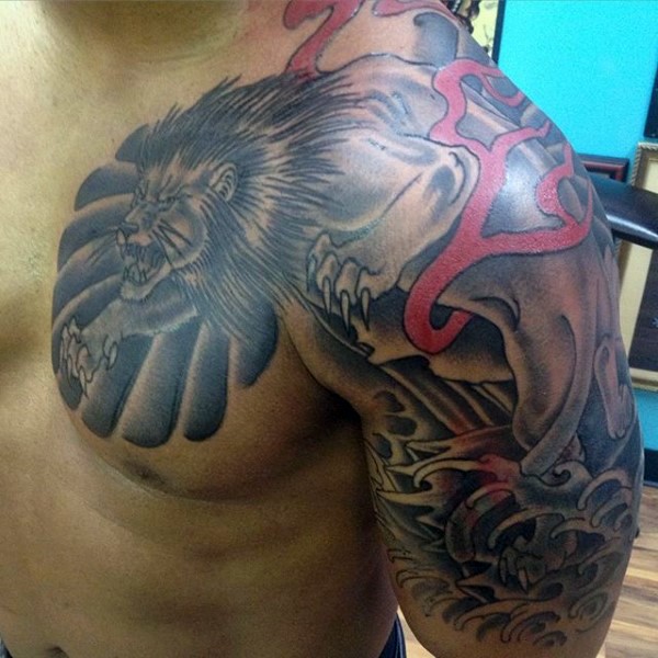 Japanese traditional black and white shoulder tattoo of lion with waves