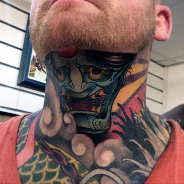 Japanese traditional style colored neck tattoo of demon face