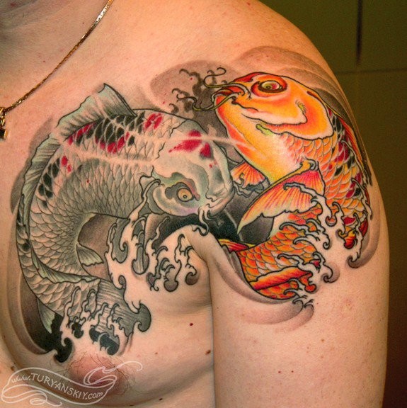 Japanese traditional style colored shoulder and chest tattoo of various fishes