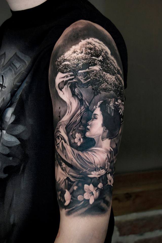 Japanese woman and tree tattoo on shoulder