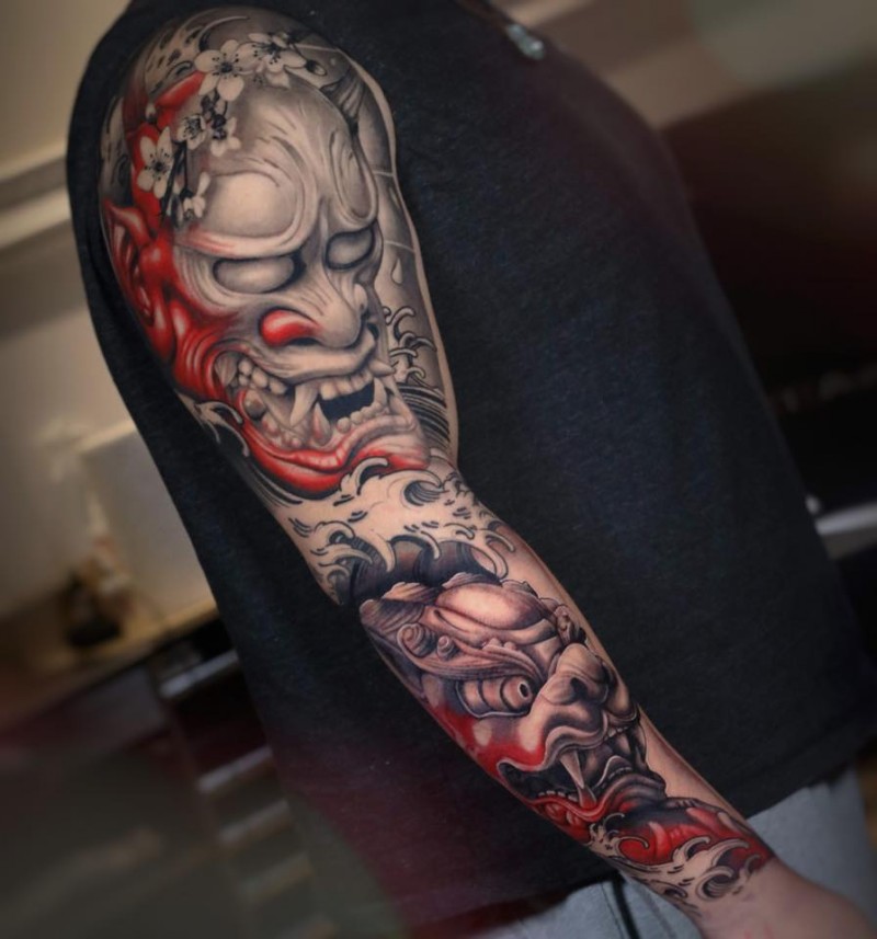 Japenese graphic full sleeve tattoo