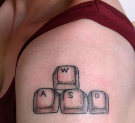 Keyboard buttons geek tattoo on shoulder
