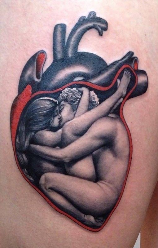 Kissing couple in heart tattoo by Matteo Pasqualin