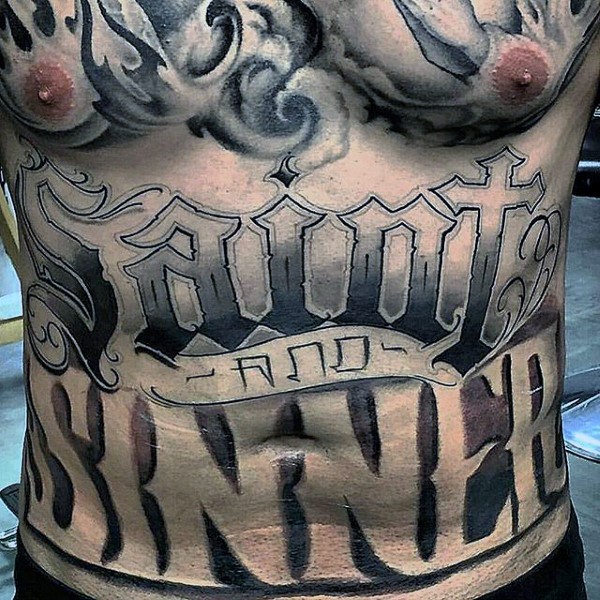 Large black ink ambigram tattoo on belly
