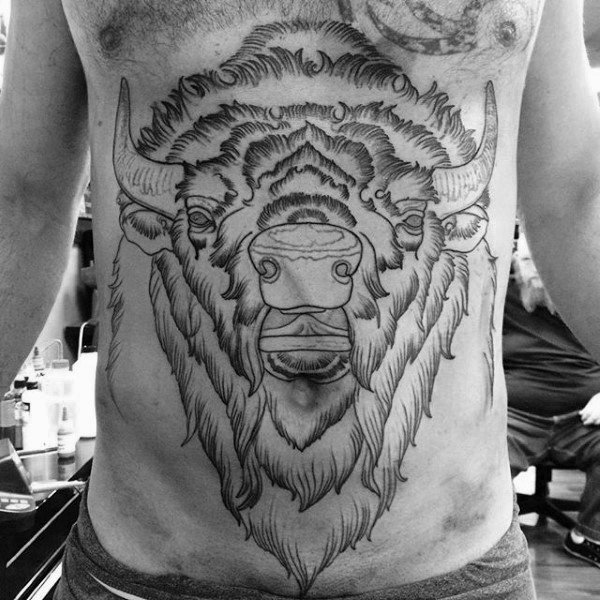 Large black ink belly tattoo of incredible bull
