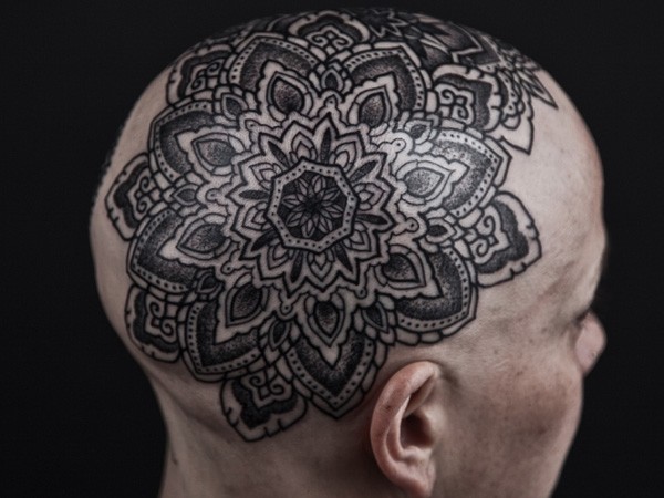 Large black ink head tattoo of gorgeous flower