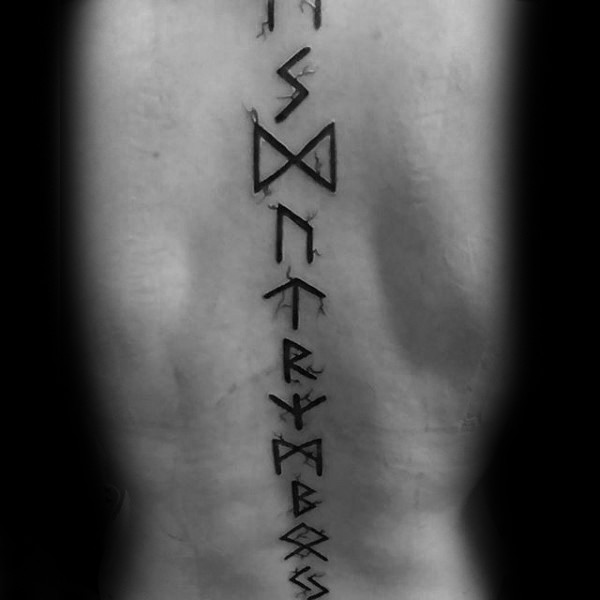 Large black ink whole back tattoo of mystical symbols