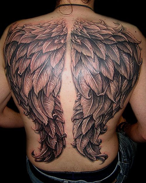Large black wings tattoo on back