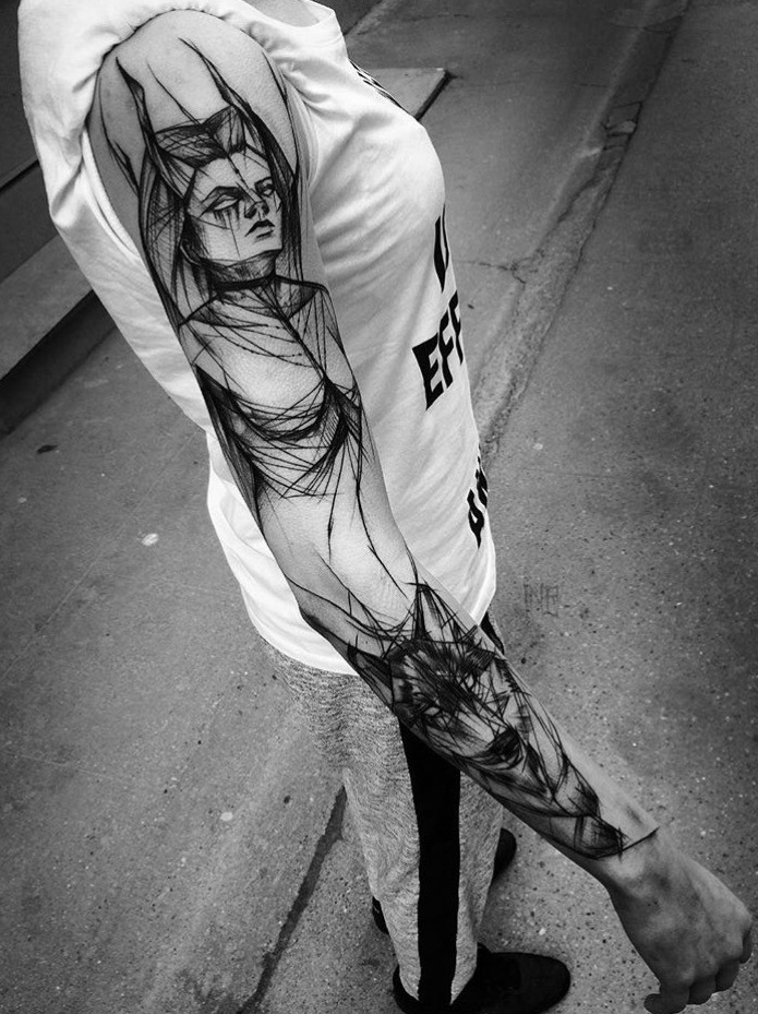 Large blackwork style painted by Inez Janiak sleeve tattoo of demonic woman with wolf