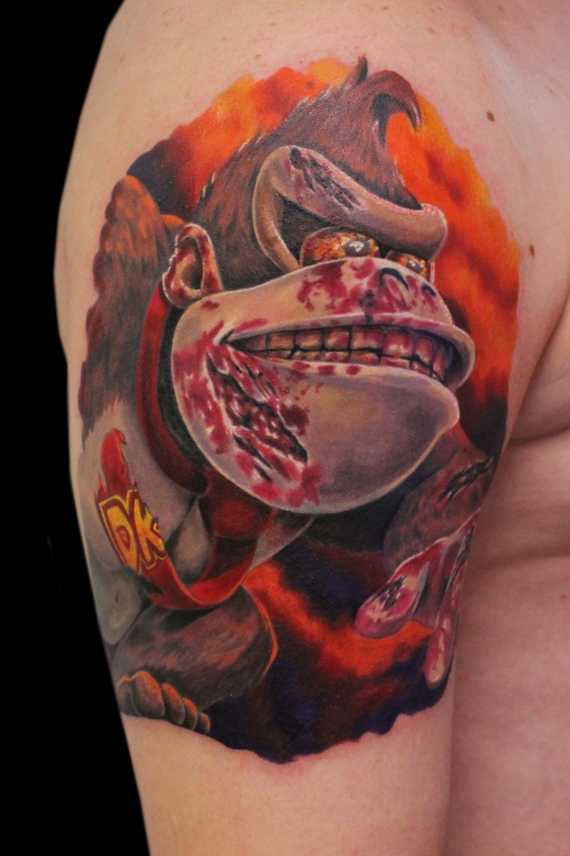Large colored shoulder tattoo of bloody evil monkey