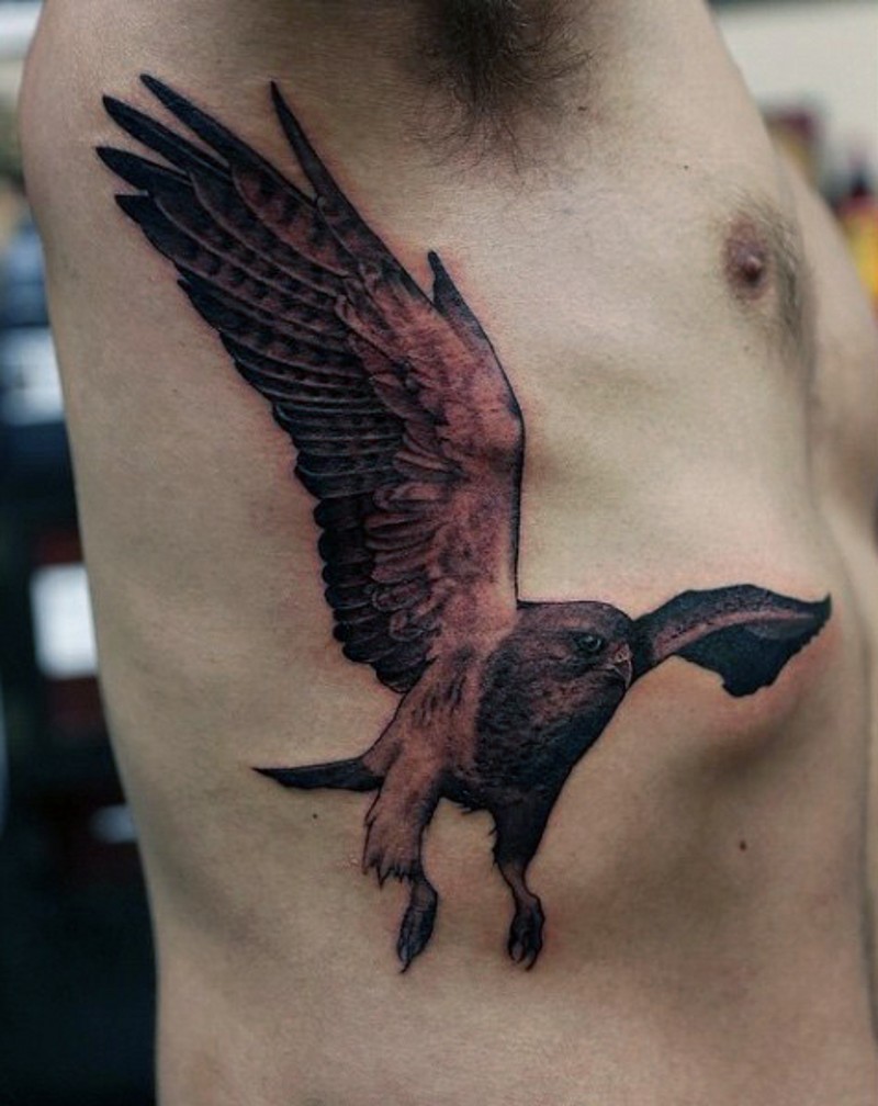 Large detailed drawn colored side tattoo of flying eagle