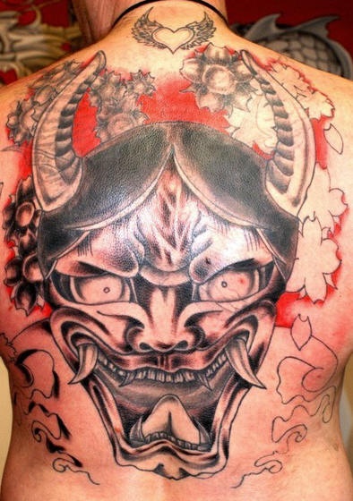 Large hannya mask tattoo on back