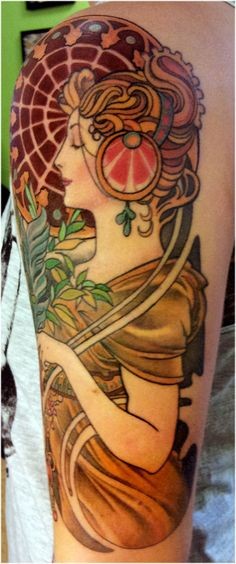 Large illustrative style colored shoulder tattoo of woman with flowers