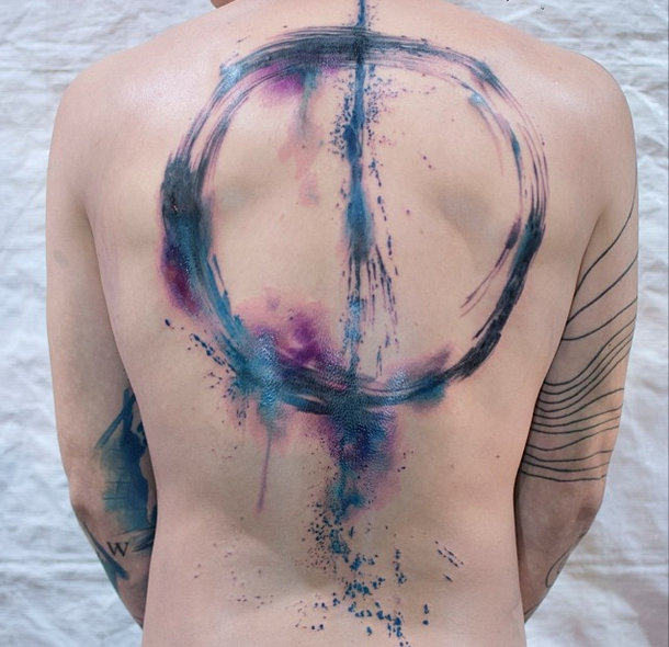 Large illustrative style whole back tattoo of mystical circle with line