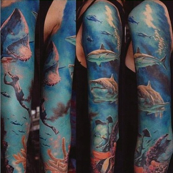 Large multicolored sleeve tattoo of underwater like with sharks and fishes