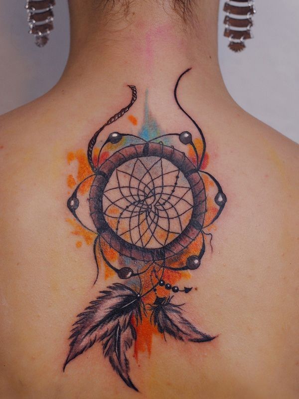 Large new school style colored back tattoo of dream catcher