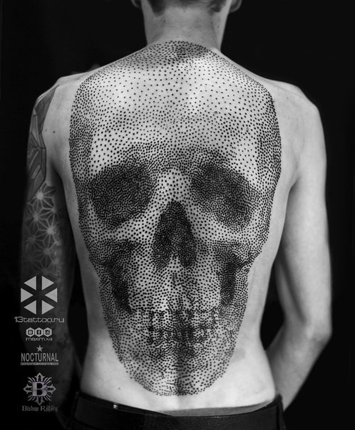 Large stippling style whole back tattoo of human skull