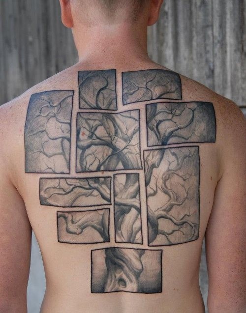 Large tree puzzle tattoo on back