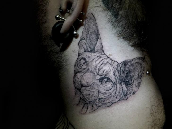 Large very detailed neck tattoo of sphinx cat head