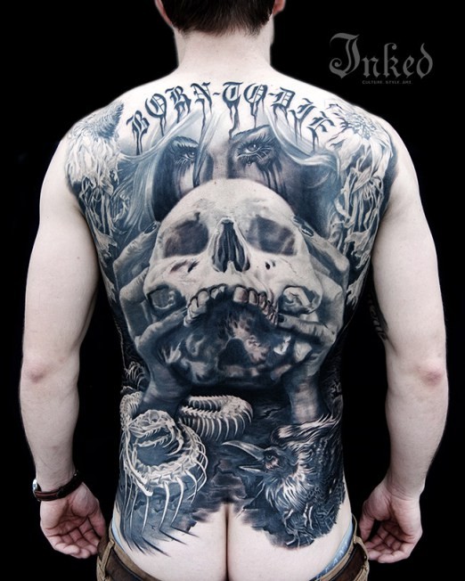 Large very detailed whole back tattoo of creepy woman with human skull and lettering