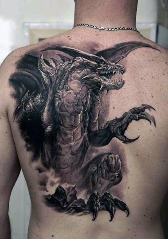 Large very detailed whole back tattoo of fantasy dragon