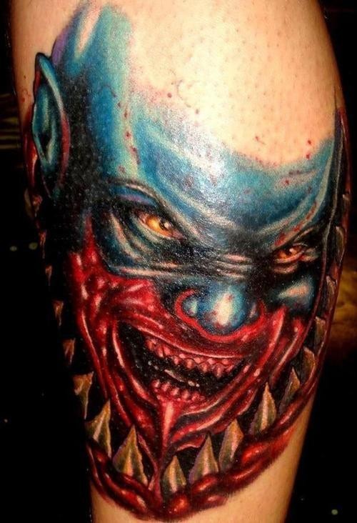 Large video games style colored bloody monster face tattoo