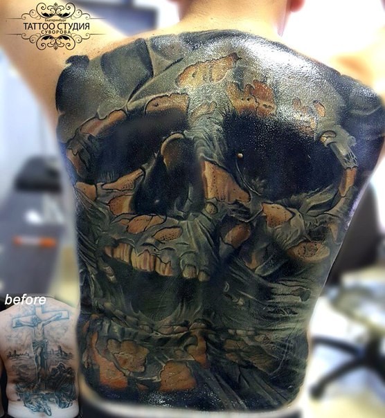 Large whole back tattoo of mystic skull with waters