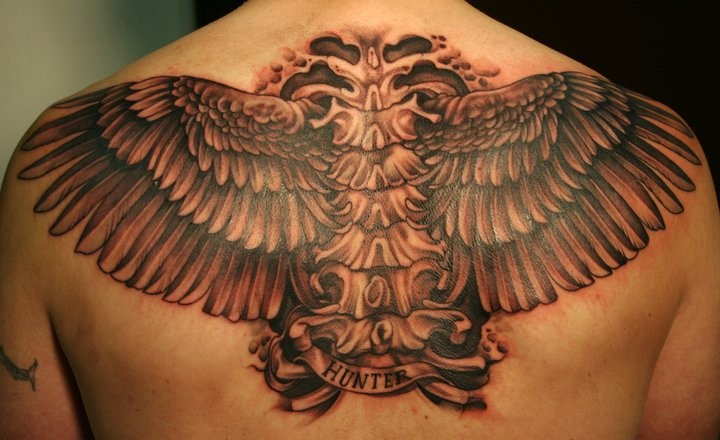 Large wings tattoo on back