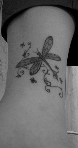 Leg tattoo, gray, flying dragonfly, decorated