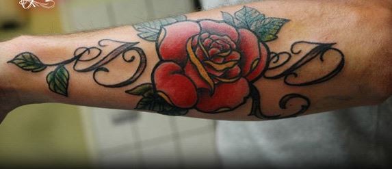 Lettering with red rose forearm tattoo