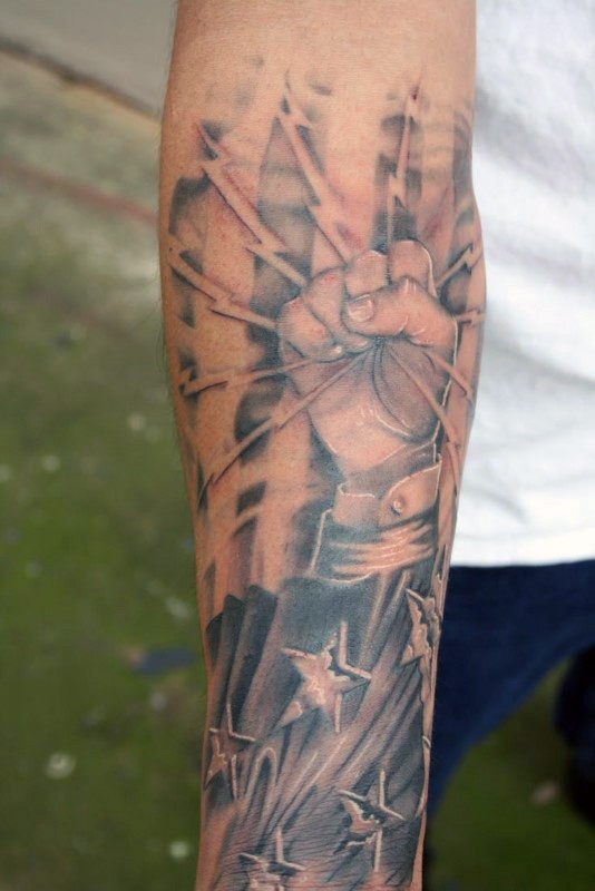 Lifelike detailed forearm tattoo of lineman worker with stars and flag