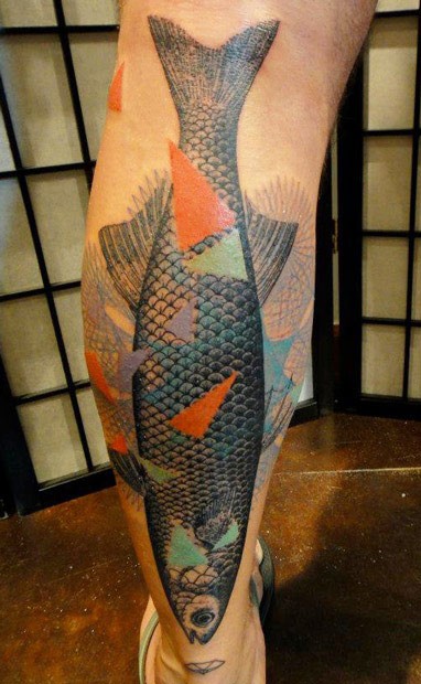 Lifelike large colored leg tattoo of fish with geometrical figures