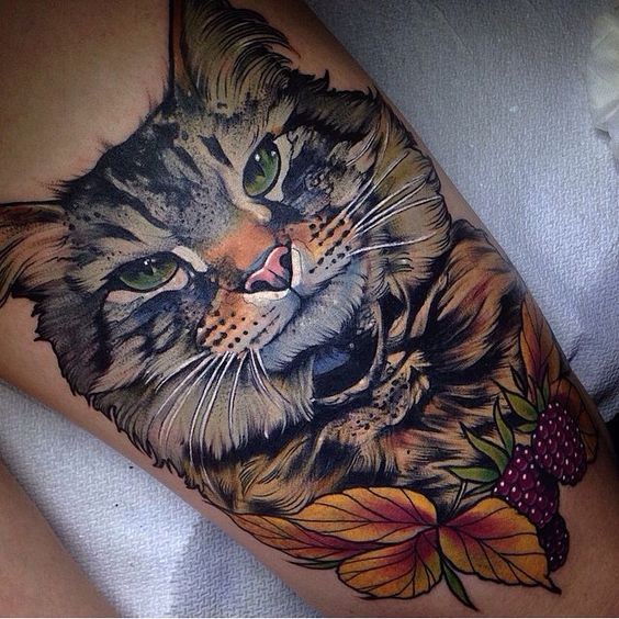 Lifelike multicolored thigh tattoo on beautiful cat tattoo with leaves and raspberries