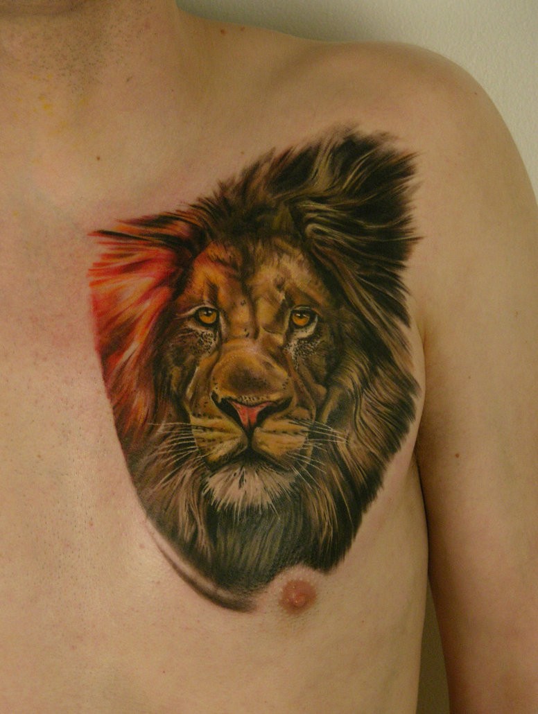 Lion head tattoo designer on the man's chest