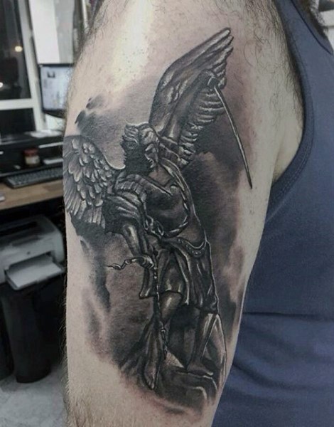 Little black and white shoulder tattoo of angel warrior with snake
