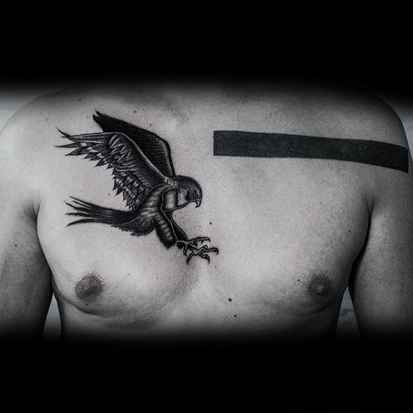 Little black ink eagle tattoo on chest