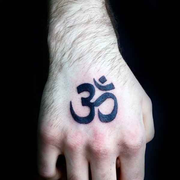 Little black ink hand tattoo of Hinduism symbol