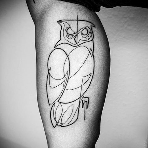 Little black ink owl sketch tattoo on leg