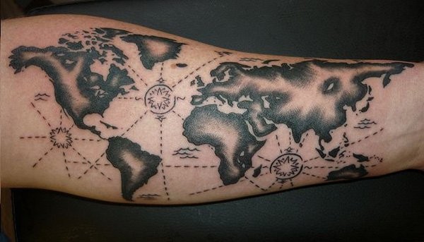 Little black ink world map tattoo stylized with interesting symbols