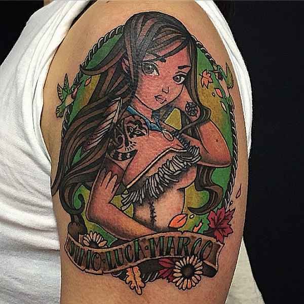 Little cartoon style colored shoulder tattoo fo Indian girl with lettering and flowers