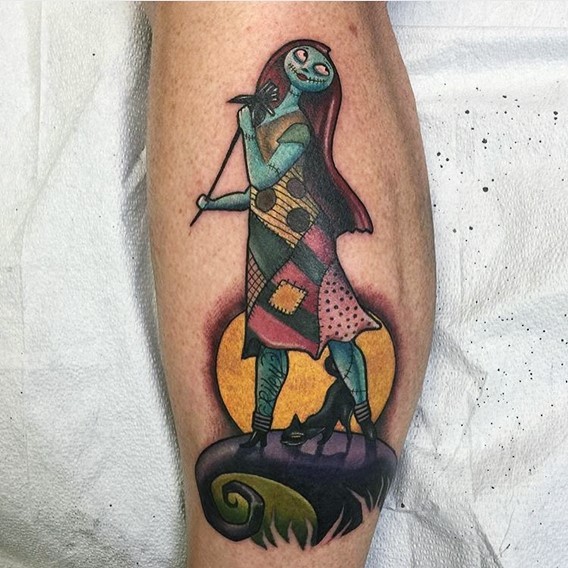 Little colorful very detailed Monster cartoon hero with cat on leg tattoo
