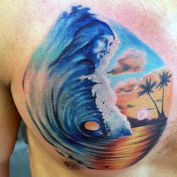 Little colorful waves with Jesus face and island tattoo on chest