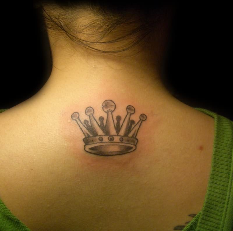Little crown tattoo on back for girls