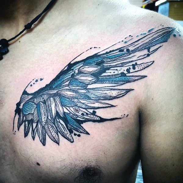 Little homemade like colored wing tattoo on chest