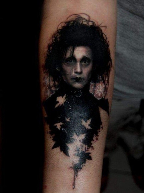 Little natural looking colored Edward Scissorhands hero tattoo on forearm