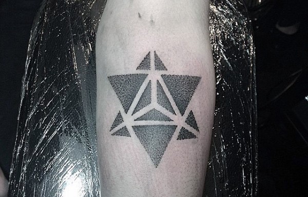 Little nice geometrical black ink tattoo on arm