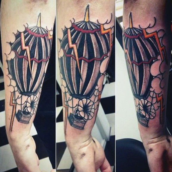 Little old school colored balloon with old gramophone tattoo on arm