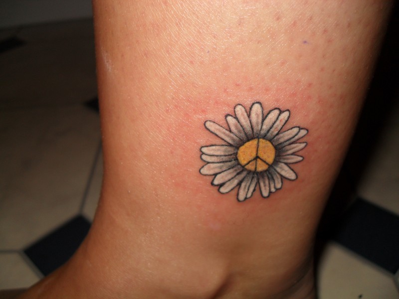 Little peace daisy flower tattoo on ankle