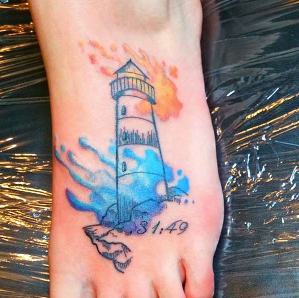 Little watercolor like foot tattoo of lighthouse with numbers