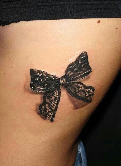 Lovely black lace bowknot tattoo on thigh for women